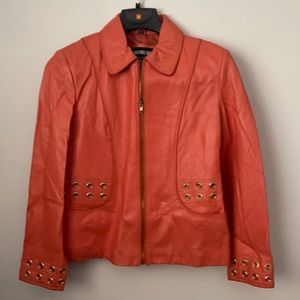 Orange leather jacket by the Stampede Collection